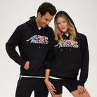 Two people wearing black 'Predator' hoodies with an American flag design