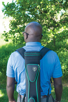 Man Wearing A McDermott Sport Hard Pool Cue Case Black/Green 3x5 With Backpack Straps